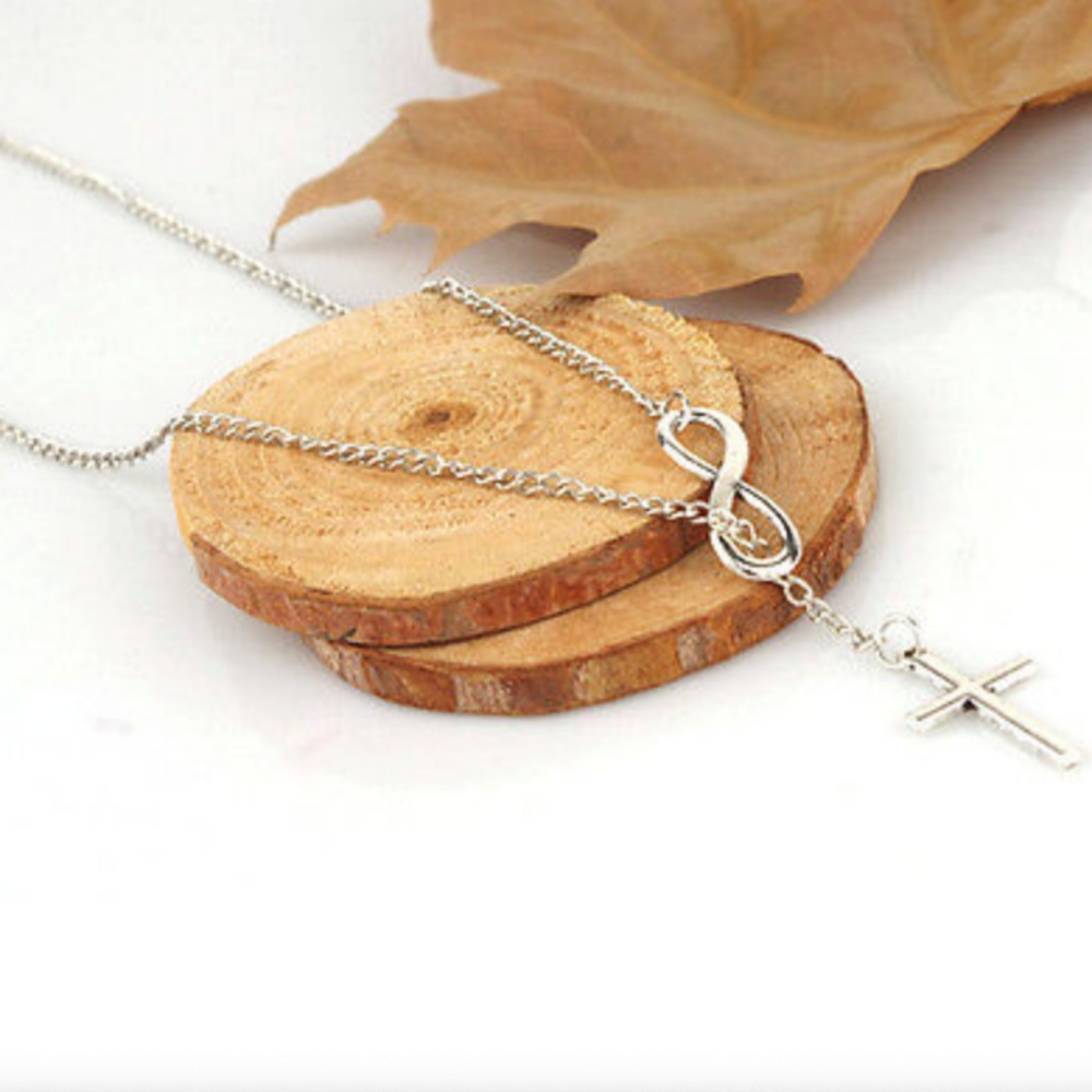 NWOT Silver Infinity Cross Lariat Necklace - Picture 2 of 3